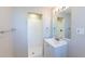 This bathroom features an updated sink and a walk-in shower at 5600 Arundel Dr, Orlando, FL 32808