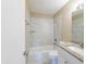 A remodeled bathroom featuring a shower/tub combo and granite vanity at 5600 Arundel Dr, Orlando, FL 32808