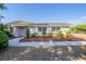 Charming home with manicured landscaping and decorative brick accents at 5600 Arundel Dr, Orlando, FL 32808
