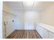 This laundry room is equipped with storage and an area for laundry, giving you everything you need at 5600 Arundel Dr, Orlando, FL 32808