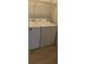Efficient laundry area equipped with a white, modern washer and dryer for convenience at 625 Dory Ln # 204, Altamonte Springs, FL 32714