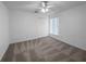 Comfortable bedroom with double closet and window at 640 Westview Dr, Minneola, FL 34715