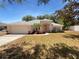 Charming one-story home with well-manicured lawn and landscaping at 640 Westview Dr, Minneola, FL 34715