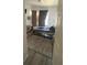 Cozy bedroom with hardwood floors, window, a bed and natural light at 6434 Cava Alta Dr # 303, Orlando, FL 32835