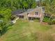 Expansive backyard featuring a screened pool, patio, and deck, perfect for outdoor living at 677 Benitawood Ct, Winter Springs, FL 32708