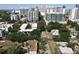 Aerial view of neighborhood apartments surrounded by lush greenery and the city skyline at 702 E Church St # 3, Orlando, FL 32801