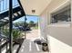 Low angle view of a white condo unit entrance featuring a black metal staircase at 702 E Church St # 3, Orlando, FL 32801
