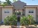 Charming condo featuring a Mediterranean-style design with an inviting gated entrance and lush, mature landscaping at 702 E Church St # 3, Orlando, FL 32801