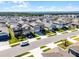 Beautiful aerial view of a residential neighborhood with manicured lawns and modern two-story homes at 7649 Ragusa Way, Clermont, FL 34714