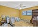 Bedroom offers ample space and natural light, perfect for relaxation or creative pursuits at 7655 Persian Ct, Orlando, FL 32819