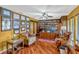 Home office with hardwood floors, custom built-in bookshelves, and plenty of room for working at 7655 Persian Ct, Orlando, FL 32819
