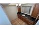 Stylish bathroom featuring a black granite countertop, vanity, mirror and overhead lighting at 7730 Broken Arrow Trl, Winter Park, FL 32792