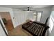 Bedroom with tile flooring, ceiling fan, closet, and French doors to the sunroom at 7730 Broken Arrow Trl, Winter Park, FL 32792