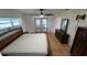 Bedroom with furniture, ceiling fan, access to a small outdoor patio via sliding doors at 7730 Broken Arrow Trl, Winter Park, FL 32792