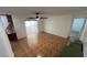 Open floor plan featuring tile flooring flowing into the kitchen and sunroom at 7730 Broken Arrow Trl, Winter Park, FL 32792