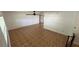 Open living room featuring tile flooring, natural light, and a ceiling fan at 7730 Broken Arrow Trl, Winter Park, FL 32792