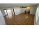 Spacious living room featuring tile flooring and access to other areas of the house at 7730 Broken Arrow Trl, Winter Park, FL 32792