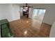 Open living room featuring tile floors and views of the kitchen and sunroom at 7730 Broken Arrow Trl, Winter Park, FL 32792