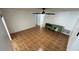 Versatile room featuring tile flooring, a ceiling fan, and a doorway at 7730 Broken Arrow Trl, Winter Park, FL 32792