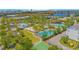 A resort-style community featuring multiple pools, a playground, and lush landscaping for luxury living and leisure at 7831 Dausset St, Orlando, FL 32827