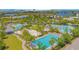 A resort-style community with multiple pools, volleyball court, and amenities perfect for luxury living and leisure at 7831 Dausset St, Orlando, FL 32827