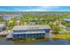 Charming lakeside restaurant with vibrant surroundings, providing a delightful dining experience with stunning water views at 7831 Dausset St, Orlando, FL 32827