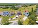 Aerial view showcasing the home's location near green spaces and other residences at 905 Ocala Woods Ln, Orlando, FL 32824