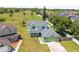 Two story home with a 2 car garage, nice landscaping and ample yard space at 905 Ocala Woods Ln, Orlando, FL 32824