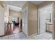 Foyer with tile floors and a closet that opens to the living room and bathroom at 905 Ocala Woods Ln, Orlando, FL 32824