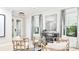 Bright living room with chic furniture and stylish accents at 1048 Teal Creek St, St Cloud, FL 34771