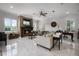 Bright living room with marble floors, a fireplace, and ample seating at 11014 Hawkshead Ct, Windermere, FL 34786