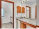 Bathroom featuring a large mirror and vanity at 117 Honeywood Dr, Kissimmee, FL 34743