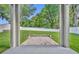 View of backyard from under the covered patio at 131 Calabria Springs Cv, Sanford, FL 32771