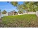 Exterior view of backyard with lawn and privacy fence at 131 Calabria Springs Cv, Sanford, FL 32771