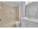 Bathroom with a bathtub and a single sink vanity at 131 Calabria Springs Cv, Sanford, FL 32771
