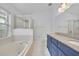 Elegant bathroom with a double vanity, soaking tub, and separate shower at 131 Calabria Springs Cv, Sanford, FL 32771