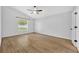 Bedroom with wood-look floors and a ceiling fan at 131 Calabria Springs Cv, Sanford, FL 32771