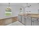 Bright kitchen features tile floor, stainless steel appliances and breakfast nook at 131 Calabria Springs Cv, Sanford, FL 32771
