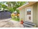 The backyard features a patio area, shed, and artificial turf at 14 N Lawsona Blvd, Orlando, FL 32801
