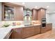 Modern kitchen with stainless steel appliances, updated cabinetry, quartz countertops, and tile backsplash at 14 N Lawsona Blvd, Orlando, FL 32801