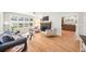 Bright and airy living room with hardwood floors, fireplace, and ample natural light at 14 N Lawsona Blvd, Orlando, FL 32801