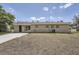 A shot of the back of the house showing the large backyard at 1602 Sheffield Rd, Leesburg, FL 34748