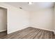 This bedroom has attractive laminate flooring and neutral paint at 1602 Sheffield Rd, Leesburg, FL 34748