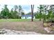 Backyard view of the property with ample space, providing a serene, natural setting at 16908 Sw 44Th Cir, Ocala, FL 34473