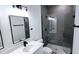 Contemporary bathroom featuring a glass shower and black fixtures at 16908 Sw 44Th Cir, Ocala, FL 34473