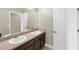 Bathroom with double sink vanity, large mirror and ample counter space at 17117 Cypress Preserve Pkwy, Orlando, FL 32820