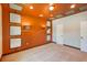 Carpeted bedroom features statement wall decorations, recessed lighting, and neutral walls and ceiling at 17117 Cypress Preserve Pkwy, Orlando, FL 32820