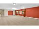 This bonus room is spacious, and has carpet floors and natural light at 17117 Cypress Preserve Pkwy, Orlando, FL 32820