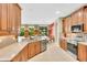 Gourmet kitchen with granite counters, stainless appliances, and ample cabinet space, ideal for cooking at 17117 Cypress Preserve Pkwy, Orlando, FL 32820