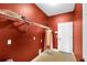 This laundry room offers built-in shelving and a door to the rest of the home at 17117 Cypress Preserve Pkwy, Orlando, FL 32820